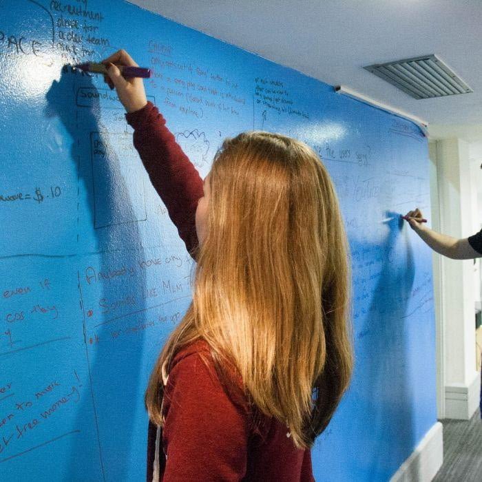 Buy dry erase whiteboard paint to create writable walls