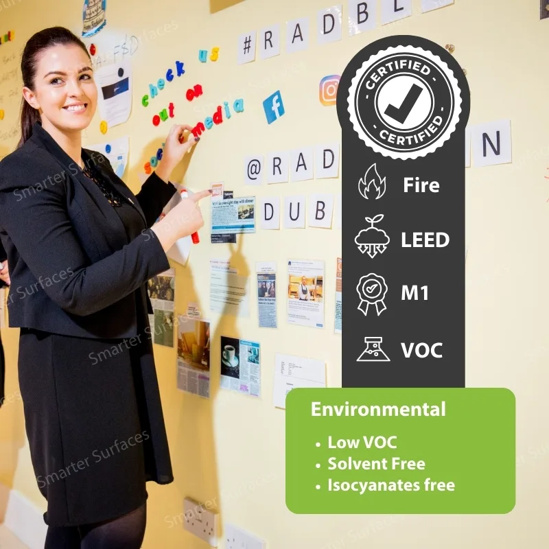 Professional woman presenting environmental product certifications including Fire safety, LEED certification, M1 emissions testing, and VOC compliance with certified badge highlighting low VOC, solvent-free, and isocyanate-free features