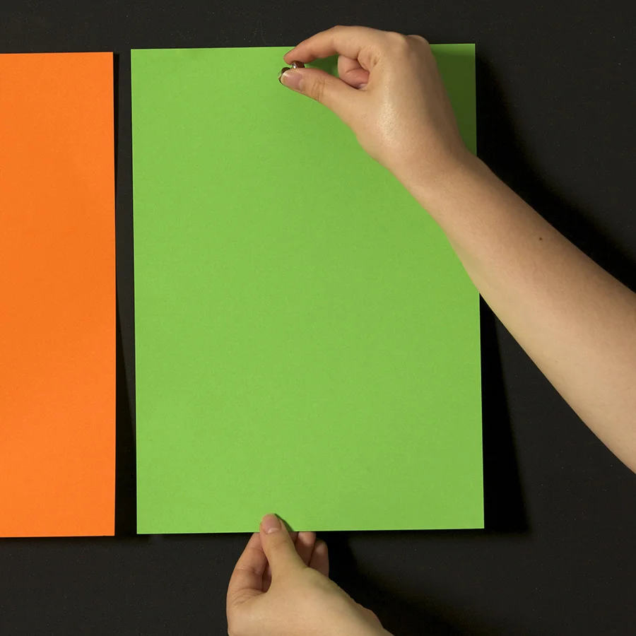 Magnets Holding Colored Papers on Super Magnetic Paint for walls