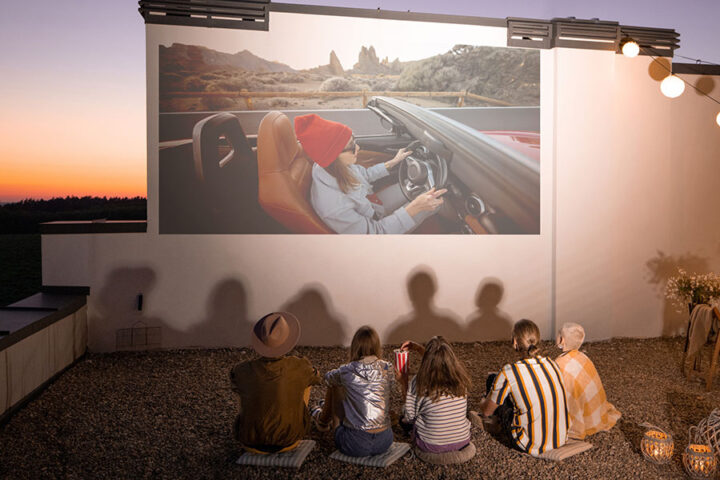 Outdoor projector screen paint on rooftop wall