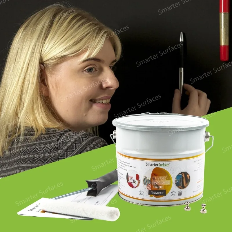 Woman applying Super Magnetic Paint on a wall using Smarter Surfaces strong magnetic wall kit