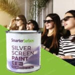 People watching projected movie on wall painted with Silver Screen Paint in home theater setup